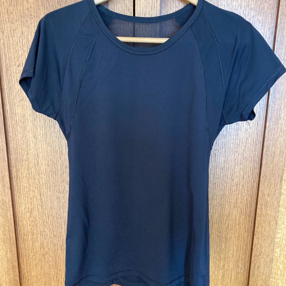 Alo Yoga top with mesh detail on back